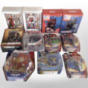 11 Mattel and other figurines to include Superman, Batman, The Walking Dead, etc., boxed.