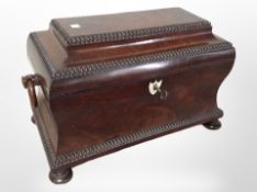 A reproduction mahogany tea caddy in the George III style, width 36cm.