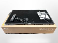 A Samsung 32-inch LCD TV with remote, and a further LG 28-inch smart TV, in box.