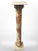 An onyx and gilt metal pedestal, height 91cm.