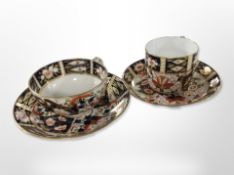 A Royal Crown Derby Imari porcelain tea cup and saucer, pattern 2451, plus another similar.