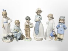 Six Lladró figures of children, tallest 25cm.