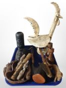 A group of treen and tribal carvings, pair of candlesticks, busts, etc.