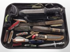 A collection of pocket knives, diving knives, Swiss Army knife, letter opener, etc.