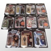 11 Kenner Star Wars figurines, boxed.