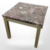 A Scandinavian marble topped lamp table on brass effect legs,