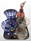 A Murano glass clown decanter, a further clown, and four various two-tone cut-crystal bowls.