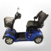A Mercury Neo mobility scooter, with charging lead and key.