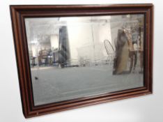 An etched over mantel mirror depicting a gypsy caravan,