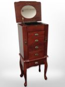 A reproduction jewellery cabinet,