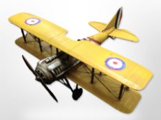 A tin plate model of a bi plane,