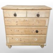 A Victorian pine five drawer chest,
