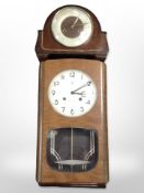 An Art Deco Smiths mantel clock and a further wall clock.