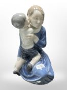 A Royal Copenhagen figure of a mother and child, No. 3457, height 21cm.
