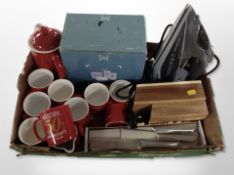 A Nescafe teapot and a quantity of mugs, new stainless steel kitchen knives, a knife block, iron,