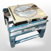 A Makita table saw, width 68cm (continental plug).
