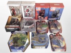11 Mattel and other figurines to include Superman, Batman, The Walking Dead, etc., boxed.