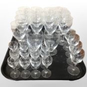 31 assorted etched continental drinking glasses.