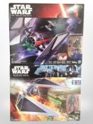 Two Hasbro Disney Star Wars models, Tie Striker and Tie Fighter, boxed.