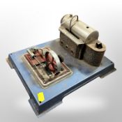 A live steam stationary piston engine and boiler on plinth, length 30cm.