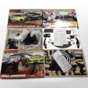 Three Micro Scalextric racing sets, in boxes.