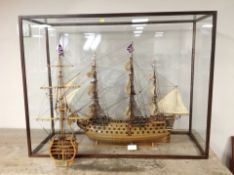 An impressive scale model of HMS Victory in glazed mahogany display case,