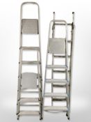 Four various aluminium ladders.