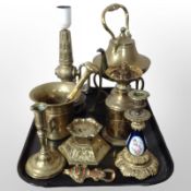 A group of brass ware to include spirit kettle on stand, lamp base, oil lamp, candlesticks,