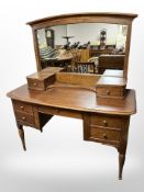A Willis and Gambier mirror backed dressing table fitted five drawers,