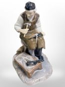 A Bing & Grøndahl figure of a cobbler, No. 2228, height 22cm.