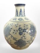 A reproduction Chinese blue and white crackle-glazed bulbous vase, height 26cm.