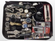 A large quantity of lady's and gent's wristwatches including Casio, Lorus, Accurist, Geneva, etc.