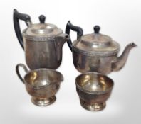 A silver-plated four-piece tea service.