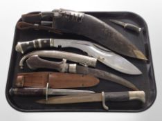 A group of knives including Second World War German parade bayonet, kukri,