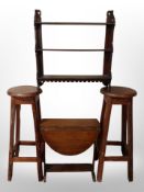 A mahogany wall shelf, width 60cm, together with a small oak drop-leaf table and a pair of stools.