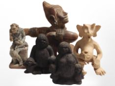 A pair of pottery figures stamped 'Ramsing, Denmark', an Eastern terracotta figure, and two others.