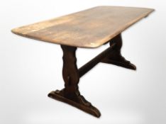 An Ercol refectory dining table,