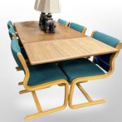 A 20th-century Danish teak and pine rectangular extending dining table,