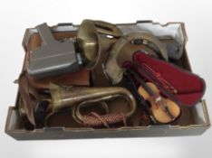 A group of brass horns and bugles, miniature violin in case,