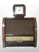 A GEC valve radio and a carved oak barometer