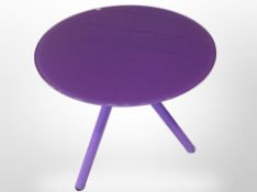 A Scandinavian purple metal and glass circular tripod coffee table,