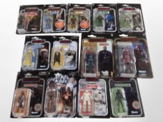 12 Kenner Disney Star Wars figurines including The Last Jedi, The Mandalorian, etc., boxed.
