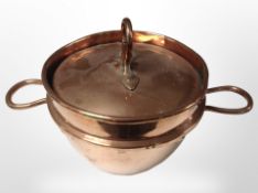 A Victorian copper twin-handled lidded vessel, height 23cm.