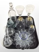 A group of Scandinavian glass ware including Holmegaard decanters, textured glass tealight holders,