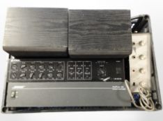 A Bose Amplus 50 Business Music amplifier, an Inkel Line amplifier,