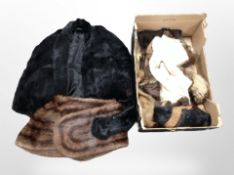 A collection of vintage mink coats and stoles.