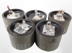 Five boxed Swarovski crystal figures of birds.