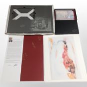 A folio gift set produced by the company KBA NotaSys containing an unframed print by Archana Yadav.