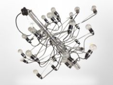 A contemporary multi branch chrome light fitting,