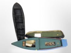 Three scale model boat hulls, longest 103cm.
